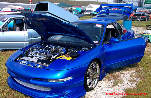 Lowriders that have been lowered, dropped, slammed, and scraping.