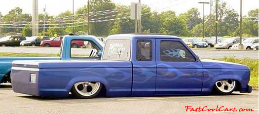 Lowriders that have been lowered, dropped, slammed, and scraping. Extremely Low rider truck.