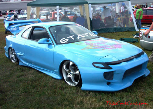 Lowriders that have been lowered, dropped, slammed, and scraping, using many different modifications.