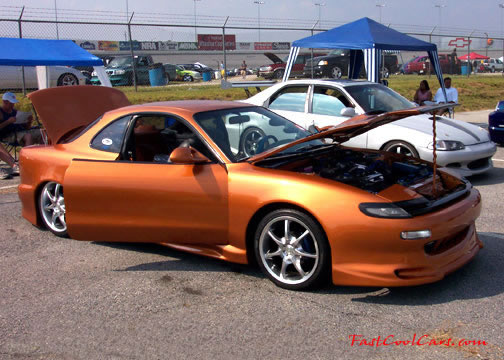 Lowriders that have been lowered, dropped, slammed, and scraping, using many different modifications.