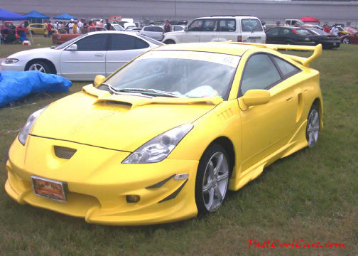Lowriders that have been lowered, dropped, slammed, and scraping, using many different modifications. Nice yellow paint.