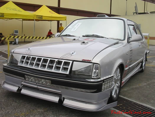 Lowriders that have been lowered, dropped, slammed, and scraping, using many different modifications.