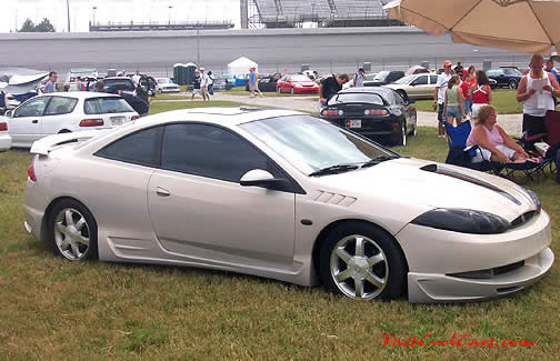 Lowriders that have been lowered, dropped, slammed, and scraping, using many different modifications.