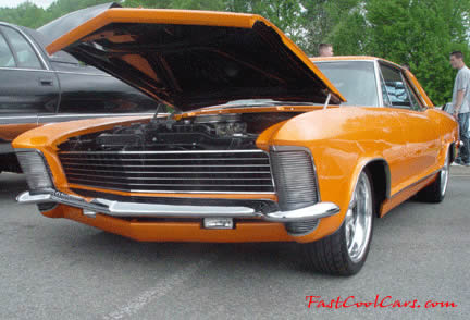 Lowriders that have been lowered, dropped, slammed, and scraping, using many different modifications. Buick.