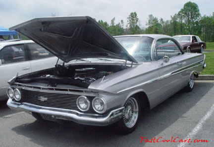 Lowriders that have been lowered, dropped, slammed, and scraping, using many different modifications.