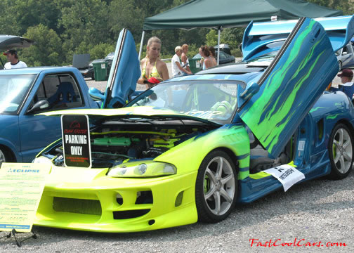 Lowriders that have been lowered, dropped, slammed, and scraping. Custom doors