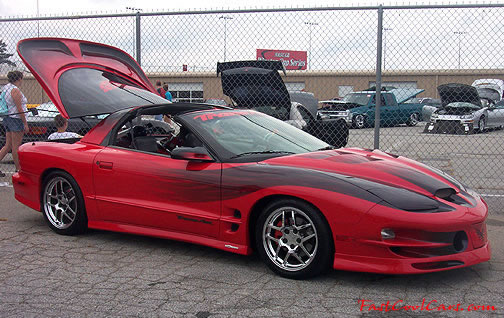 Lowriders that have been lowered, dropped, slammed, and scraping. Trans Am