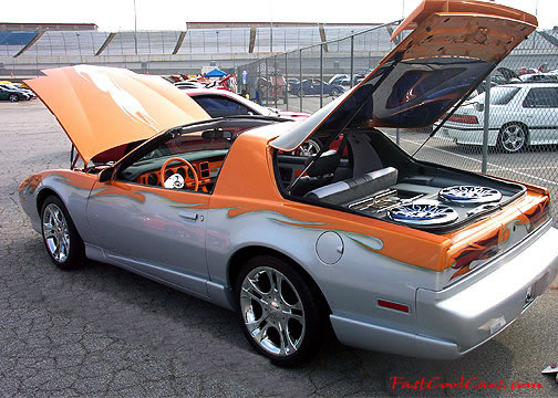 Lowriders that have been lowered, dropped, slammed, and scraping.
