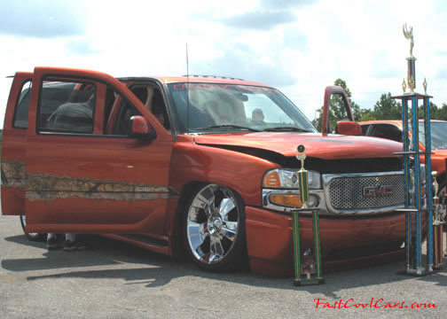 Lowriders that have been lowered, dropped, slammed, and scraping.