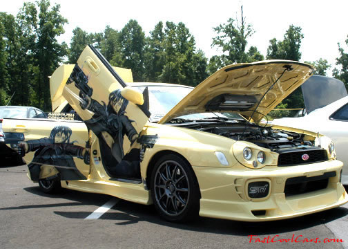 Lowriders that have been lowered, dropped, slammed, and scraping. Modified doors