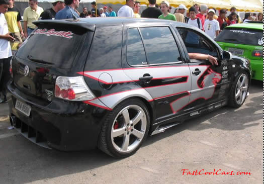 Lowriders that have been lowered, dropped, slammed, and scraping.