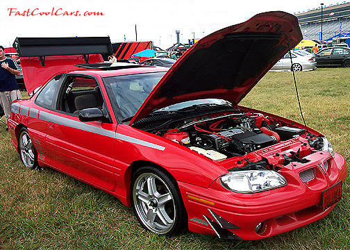 Lowriders that have been lowered, dropped, slammed, and scraping.