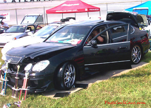 Lowriders that have been lowered, dropped, slammed, and scraping.