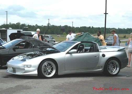 Lowriders that have been lowered, dropped, slammed, and scraping.