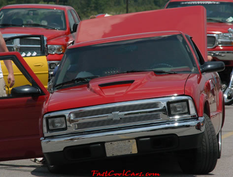 Lowriders that have been lowered, dropped, slammed, and scraping.