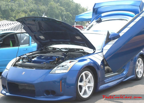 Lowriders that have been lowered, dropped, slammed, and scraping.