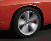 New Dodge Challenger, 6.1 V8 Hemi, 425 crank horsepower, 420 crank foot pounds of torque. SRT8