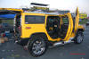 Pimped out ride, Pimp my ride with custom Yellow paint, on this Hummer with huge chrome wheels.