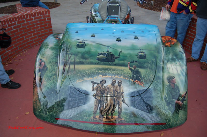 Pimped out ride, Pimp my ride with custom air brushed paint job, said to be about $25,000. for paint alone, with a 502 big block Chevrolet engine, one Pimped out trike, with huge chrome bling wheels, nice rims.