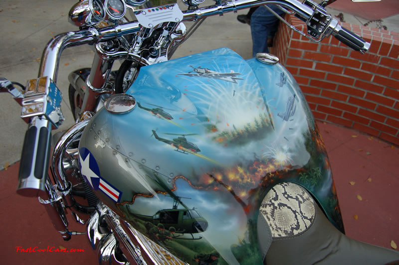 Pimped out ride, Pimp my ride with custom air brushed paint job, said to be about $25,000. for paint alone, with a 502 big block Chevrolet engine, one Pimped out trike, with huge chrome bling wheels, nice rims.