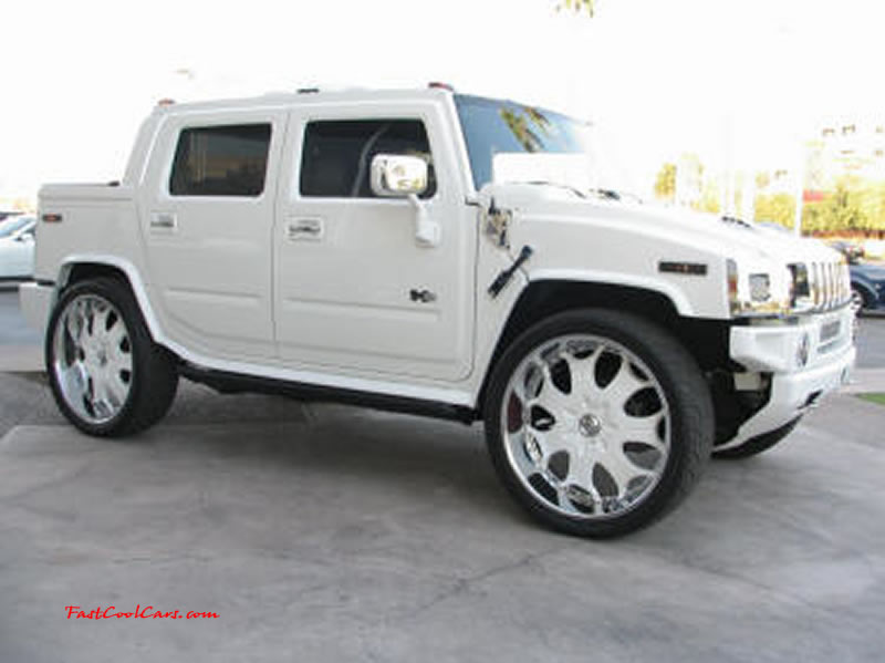 Pimped out ride, Pimp my ride with custom white paint, and huge custom white and chrome wheels, one nice Hummer.