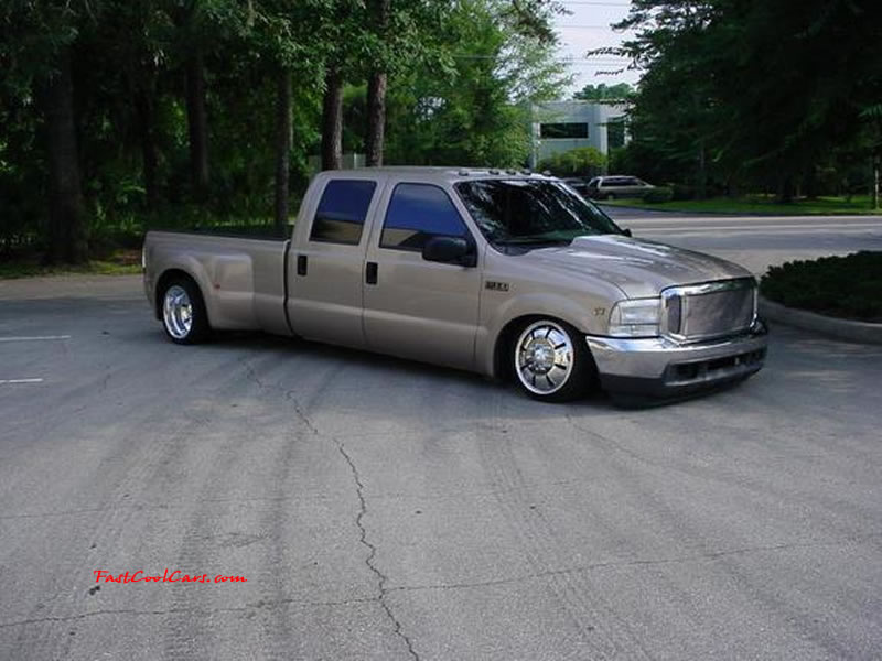 Pimped out ride, Pimp my ride with custom paint. Huge Custom wheels and a dually dropped is a nice sight.