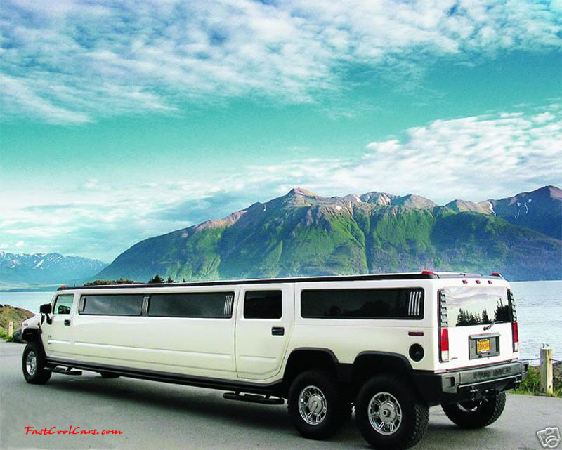 Pimped out ride, Pimp my ride with custom paint. Huge Custom wheels on a very long streched Limo Hummer, with an extra rear axle.