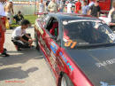Nopi Nationals - Motorsports Supershow 2005, Yokohama drifting team cars, world champion driver checking the wheel lug nuts torque.