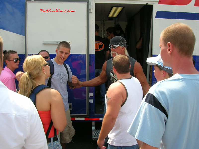 Hulk Hogan, his wife Linda, and their son Nick leaving the rear of the Foose trailer to go make announcements.